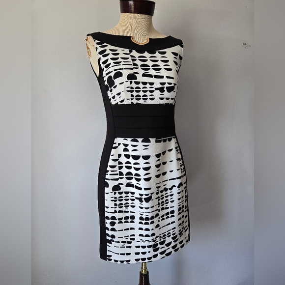 Joseph Ribkoff Black And White Broken Polka Dot Dress With Gold Neck Detail. 4 - Picture 2 of 11